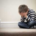Photo of a crying child, representing a victim of sexual abuse